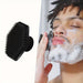 Blessing Sells black silicone facial cleansing brush with soft bristles for deep cleaning and exfoliation.