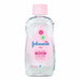 Blessing Sells Johnson's Baby Oil with Aloe & Vitamin E, 9oz bottle, clear liquid with pink label.