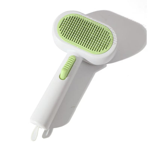 Blessing Sells white and green double-sided pet grooming comb with self-cleaning feature and comfortable grip.