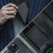 Blessing Sells men's slim carbon fiber RFID wallet with pop-up card holder and zipper pocket.