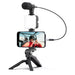 Blessing Sells smartphone vlogging kit with microphone and LED light on tripod. Includes phone mount and mini tripod for stable shots.